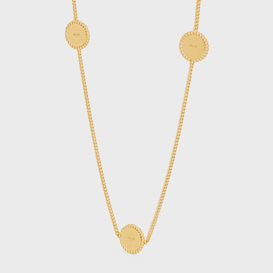 MÉDAILLE SAUTOIR IN BRASS